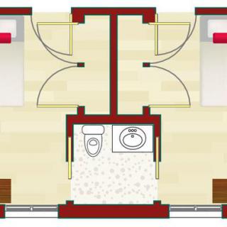 A floor plan showing two adjacent rooms with a shared bathroom in between.