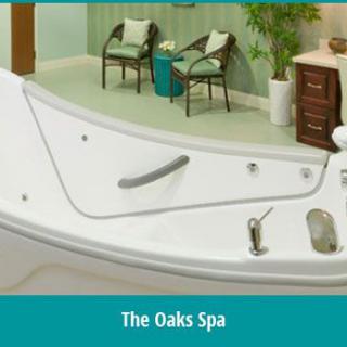 A serene setting at The Oaks Spa featuring a luxurious bathtub and peaceful decor.