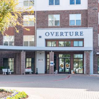 The entrance to a residential building named Overture.
