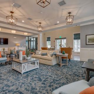 A cozy lobby area with comfortable seating and elegant decor.