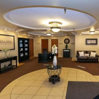 A stylish lobby area with elegant furnishings and soft lighting.