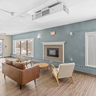 A modern and cozy living room designed for comfort and relaxation.