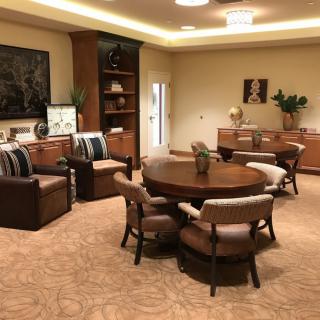 A modern living room with comfortable seating and elegant decor.