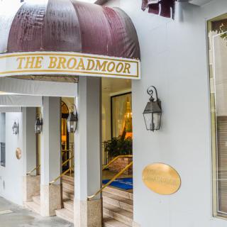 Entrance of The Broadmoor hotel with an elegant awning.