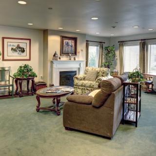 A cozy and inviting living room featuring comfortable furniture and a warm ambiance.