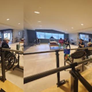 A spacious common area in a care facility where residents can gather and interact.