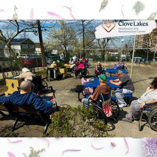 Residents enjoying a sunny day outdoors at Clove Lakes.