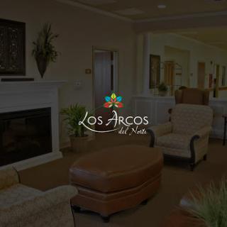 A warm and inviting living area featuring comfortable seating and a welcoming ambiance.