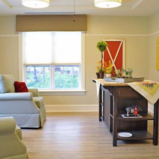 A modern living room with stylish decor and comfortable seating.