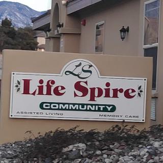 Sign for Life Spire Community, showcasing a welcoming residential area.