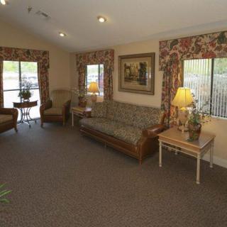 A cozy living room with comfortable seating and warm decor.