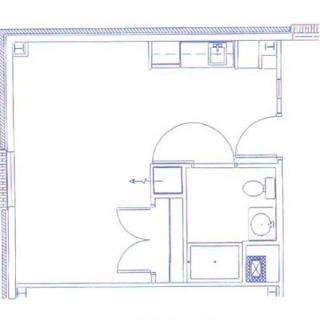 Blueprint of a small apartment layout featuring a kitchen and bathroom.