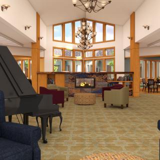 A spacious and well-lit living room with a large chandelier, comfortable seating, and a cozy fireplace.