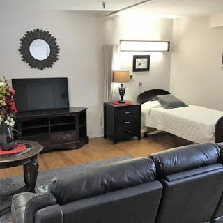 Cozy and modern living space featuring a blend of comfort and style.