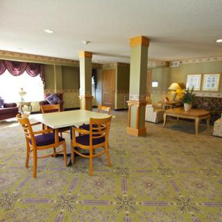 Spacious lobby with comfortable seating and elegant decor.