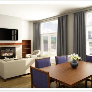 A modern living room with a dining area, featuring a fireplace and large windows adorned with curtains.