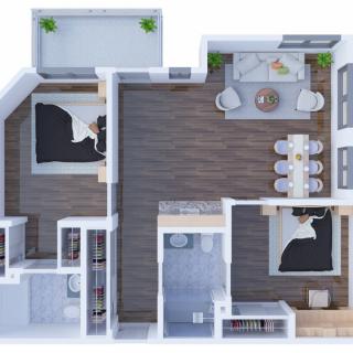 A detailed floor plan of a modern two-bedroom apartment with an open living and dining area.