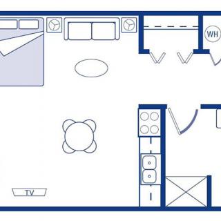 A floor plan of a studio apartment showing the arrangement of furniture and rooms, including a bed, table, kitchen area, and bathroom.