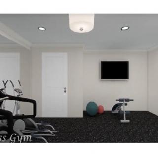 A modern home gym with exercise equipment and a wall-mounted television.