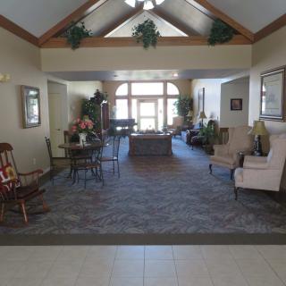 A welcoming lobby area with seating and decorative plants.