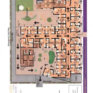 A detailed floor plan of a building showing rooms and pathways.