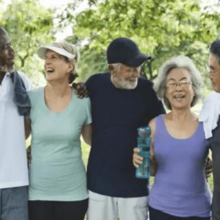 A group of friends enjoying a day out in the park, staying active and sharing smiles.