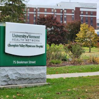 Signage for the University of Vermont Health Network at Champlain Valley Physicians Hospital.