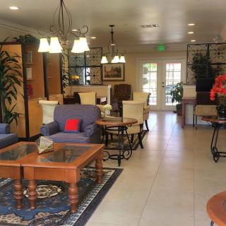 A cozy lobby with comfortable seating and elegant decor.