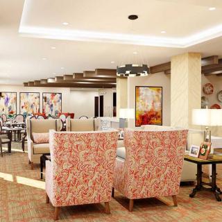 A stylish living room with patterned chairs and elegant decor.