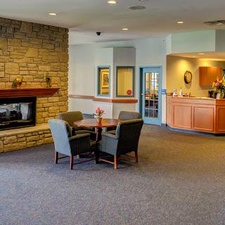 A cozy lobby featuring comfortable seating and a welcoming reception area.