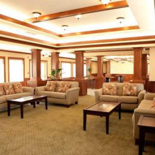 A spacious and elegantly designed lobby with comfortable seating.