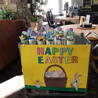 A festive display celebrating Easter with colorful decorations and treats.