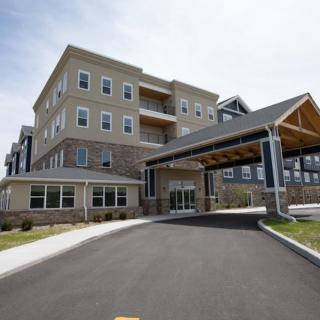 A modern residential building with a welcoming entrance.