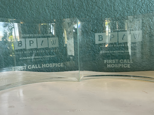 Glass awards recognizing First Call Hospice.