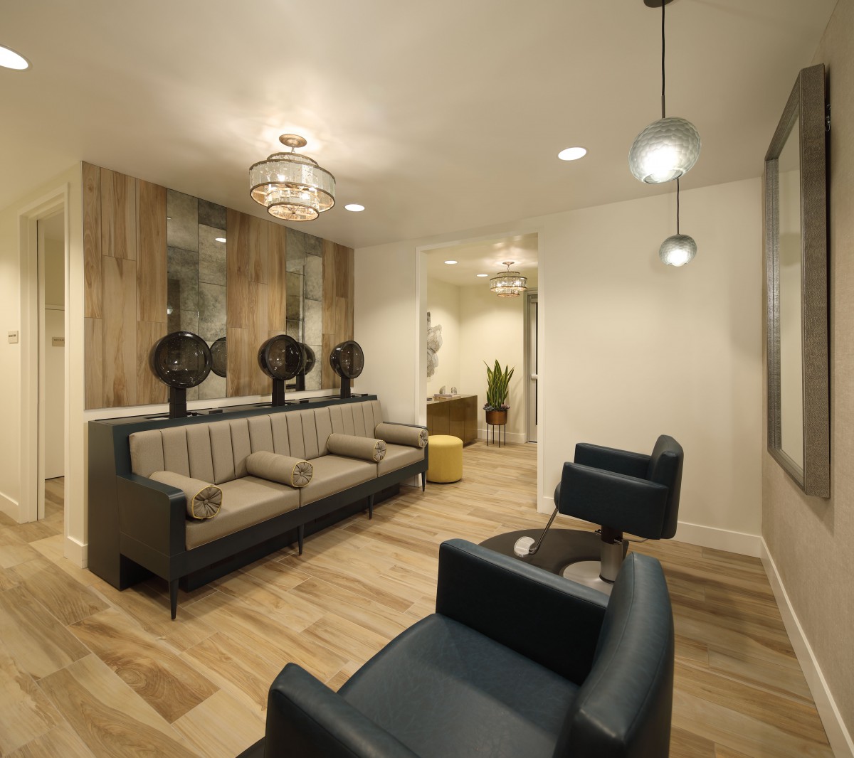 A modern lobby with stylish seating and elegant lighting fixtures.