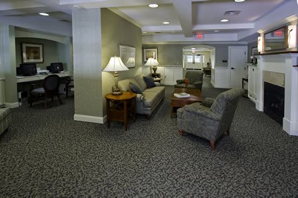 An indoor lobby area with comfortable seating and ambient lighting.