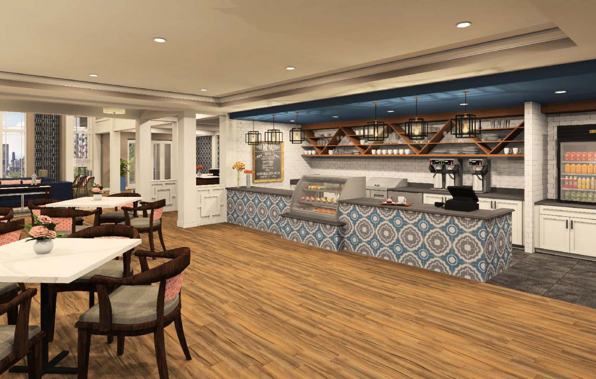 A stylish cafe interior featuring a patterned tile counter and wooden flooring.