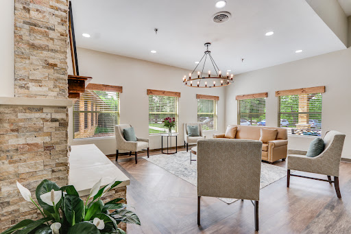 A cozy and modern living room designed to maximize natural light with elegant furnishings.