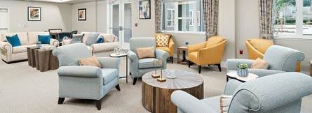 A cozy living room with modern furniture and stylish decor.