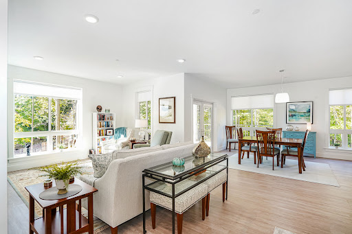 A bright and airy living room featuring modern furnishings and an open layout.