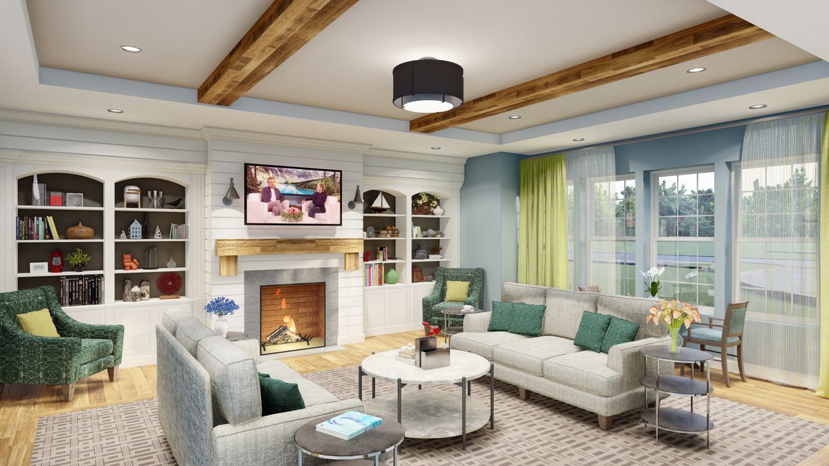 A cozy and stylish living room featuring a fireplace, comfortable sofas, and elegant decor.