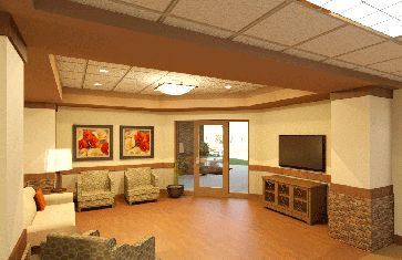 A cozy living room with comfortable seating, a television, and decorative artwork on the walls.
