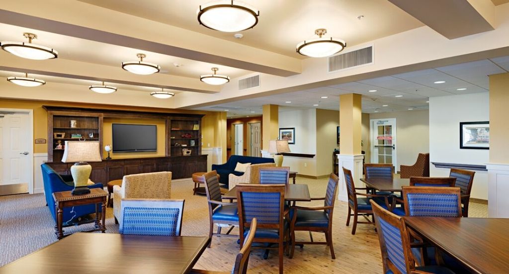 A well-lit lounge area with comfortable seating and modern decor.