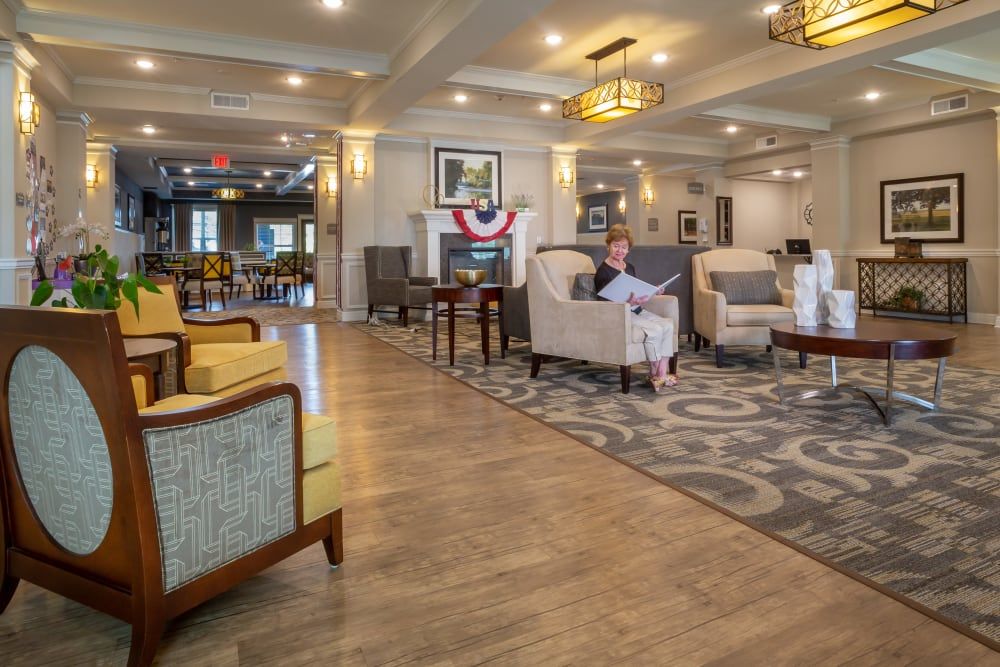 A spacious and elegantly designed lobby with comfortable seating and warm lighting.
