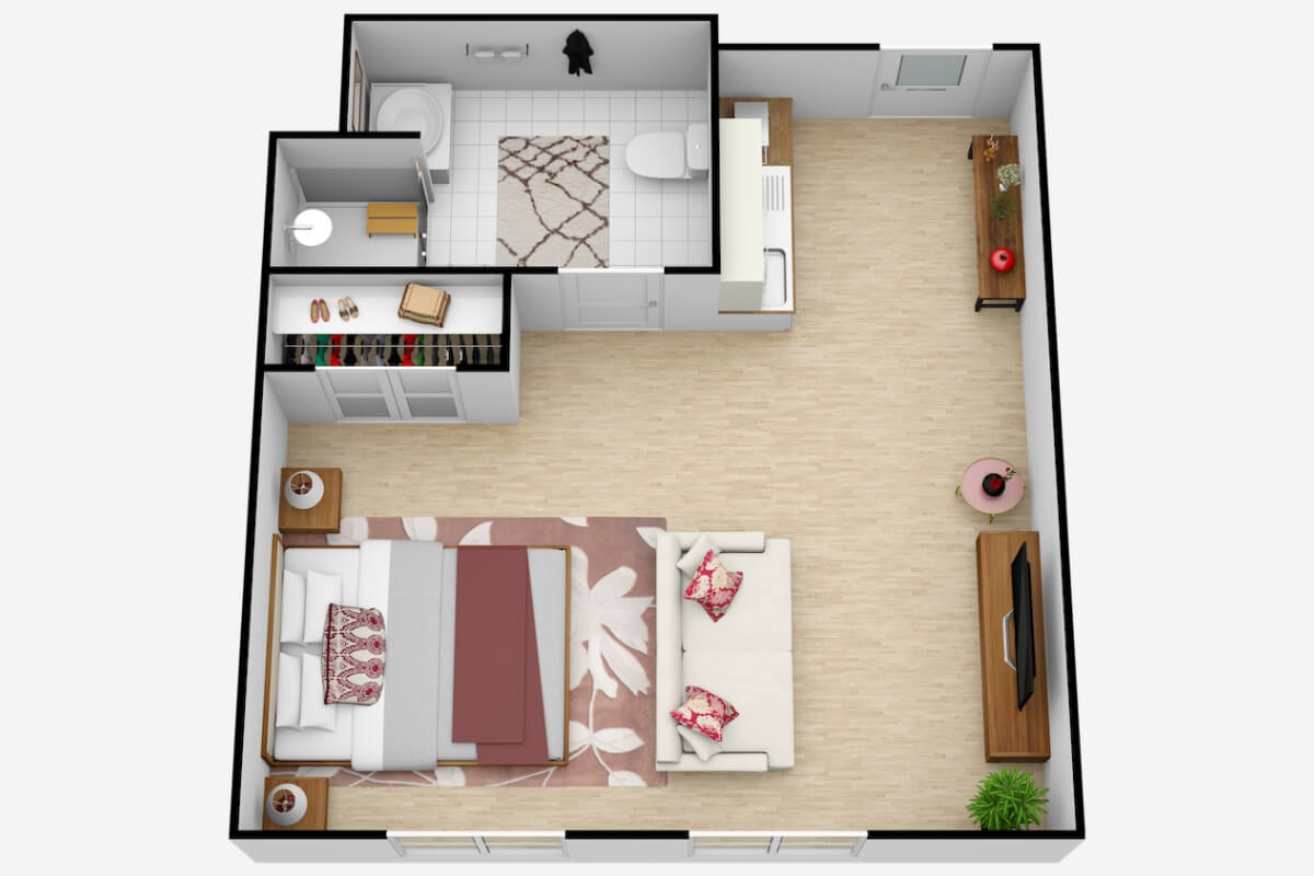 A detailed floor plan showcasing a compact apartment layout with a bedroom, living area, and bathroom.