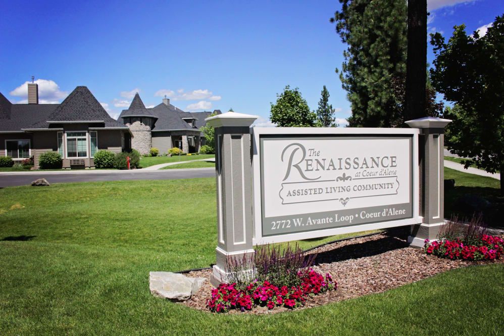 Entrance sign of The Renaissance at Coeur d'Alene showcasing a landscaped property.