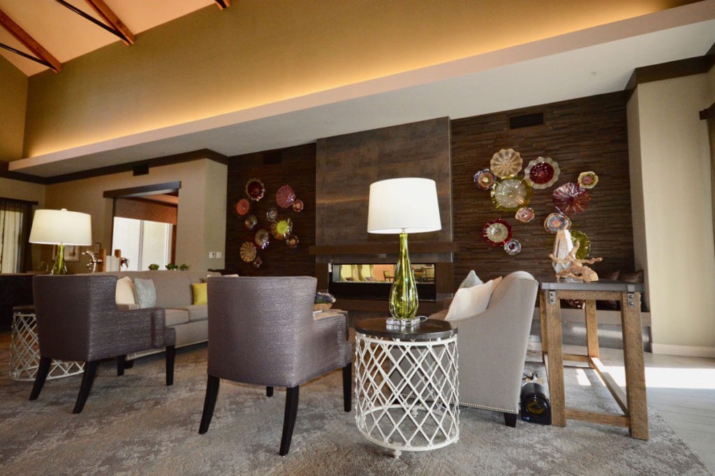 A modern living room with stylish decor and comfortable seating.