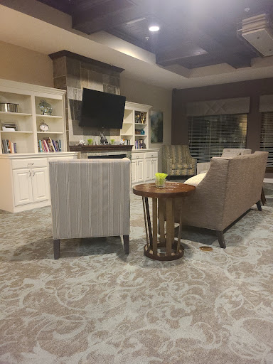 A cozy and modern living room featuring a comfortable sofa, TV setup, and stylish decor.