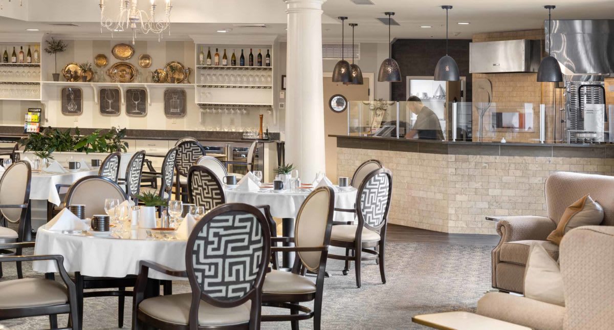 An elegant restaurant interior with stylish decor and neatly arranged dining tables.