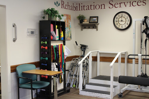 A rehabilitation service room equipped with exercise tools and a set of steps for patient training.